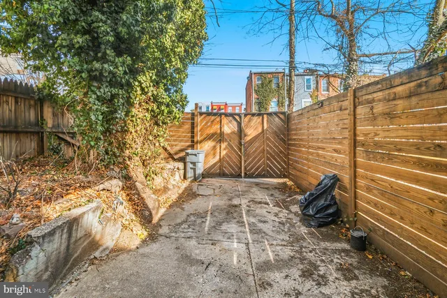 a view of a backyard of the house