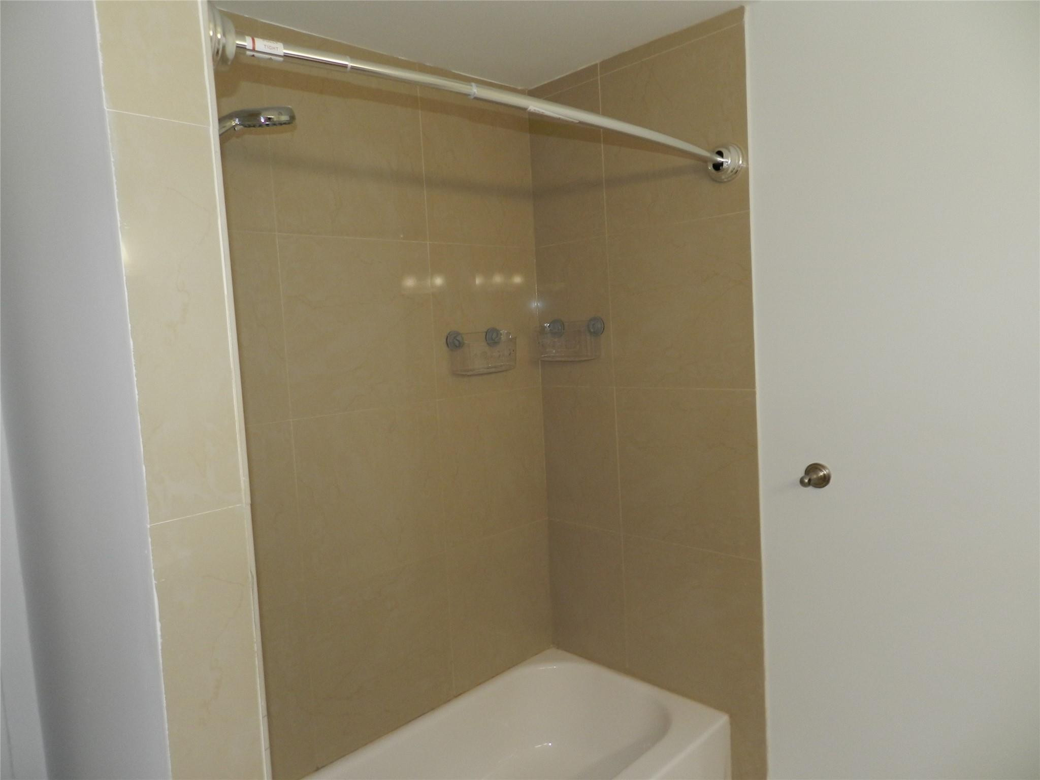 73 Deer Creek Road, Unit 103 Deerfield Beach, FL 33442 - Photo 12 of 28 Upstairs Bathroom