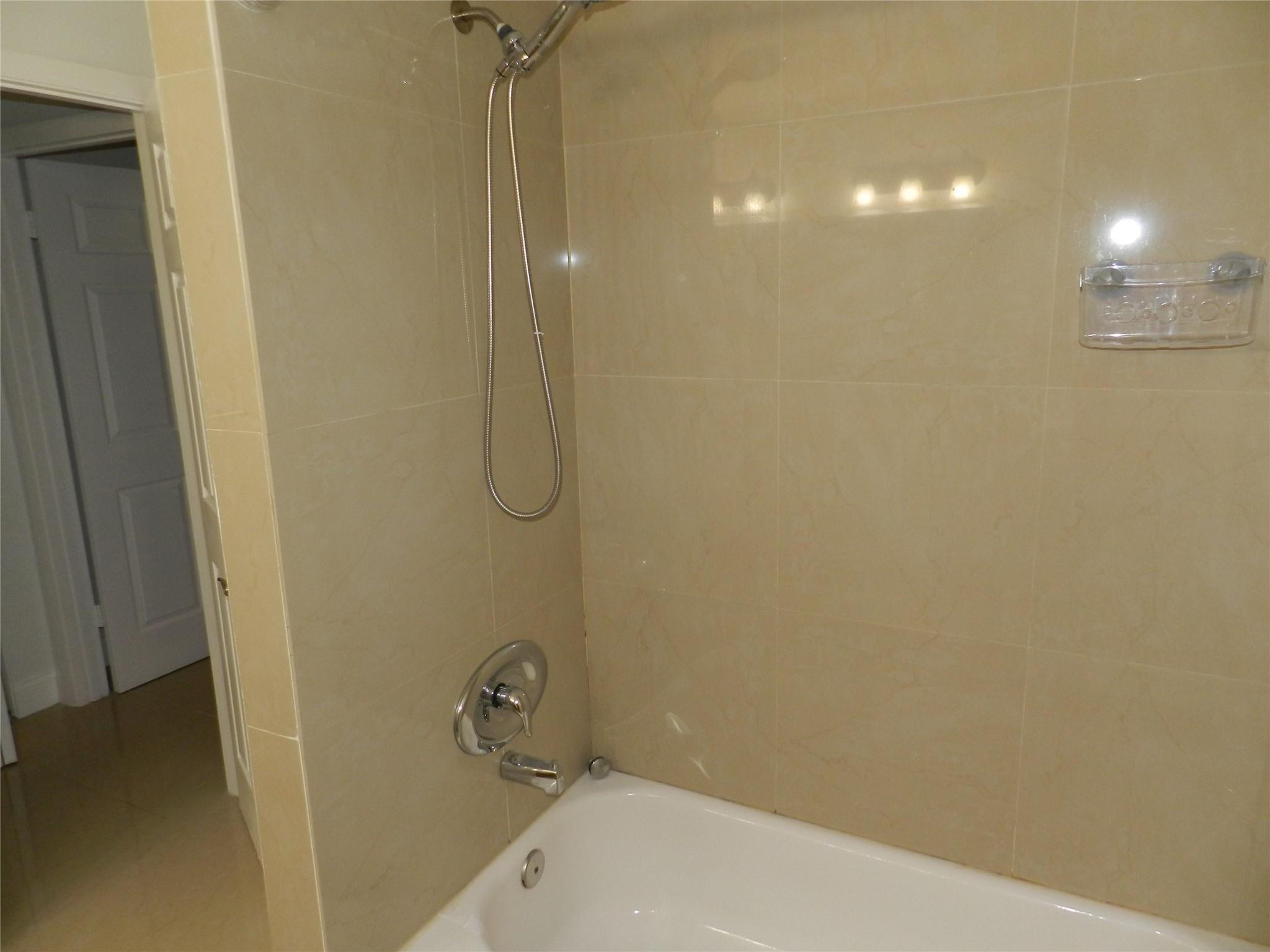 73 Deer Creek Road, Unit 103 Deerfield Beach, FL 33442 - Photo 13 of 28 Uptairs Bathroom