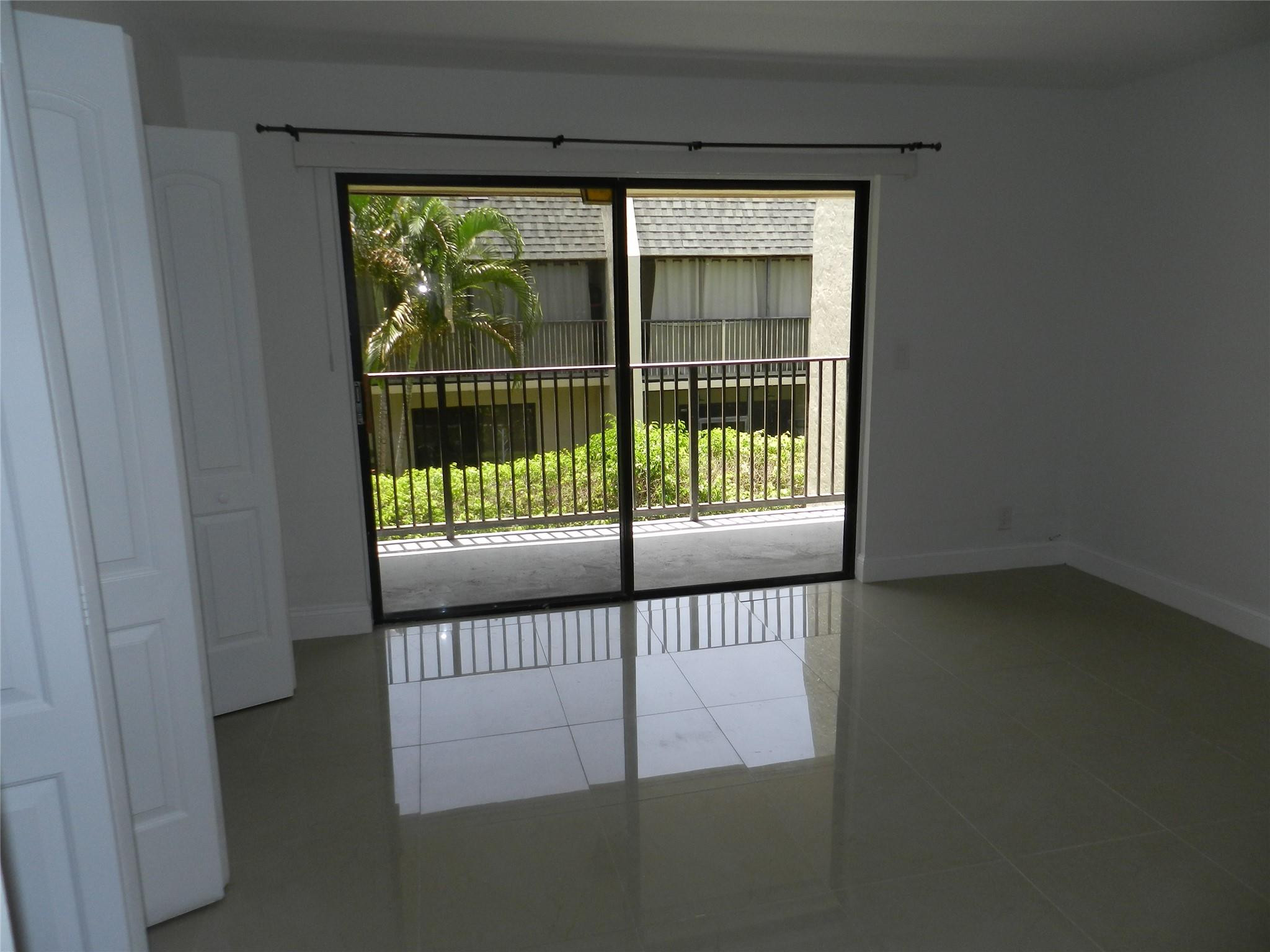 73 Deer Creek Road, Unit 103 Deerfield Beach, FL 33442 - Photo 14 of 28 Primary Bedroom