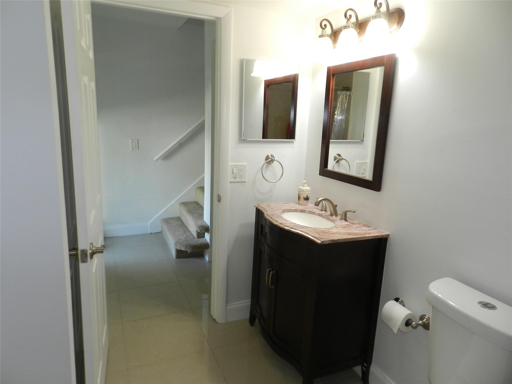 73 Deer Creek Road, Unit 103 Deerfield Beach, FL 33442 - Photo 4 of 28 Downstairs Bathroom