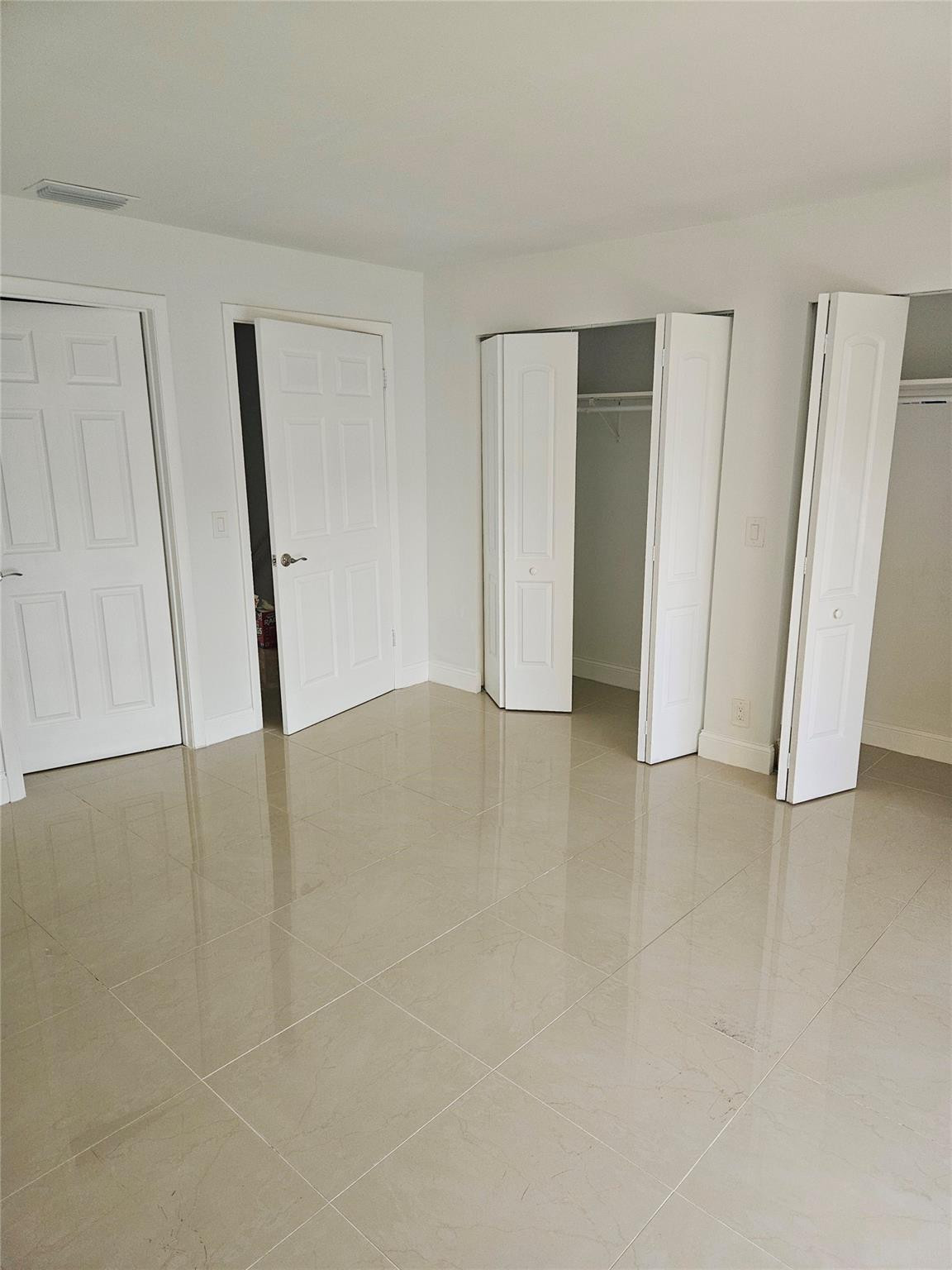 73 Deer Creek Road, Unit 103 Deerfield Beach, FL 33442 - Photo 8 of 28 Primary Bedroom