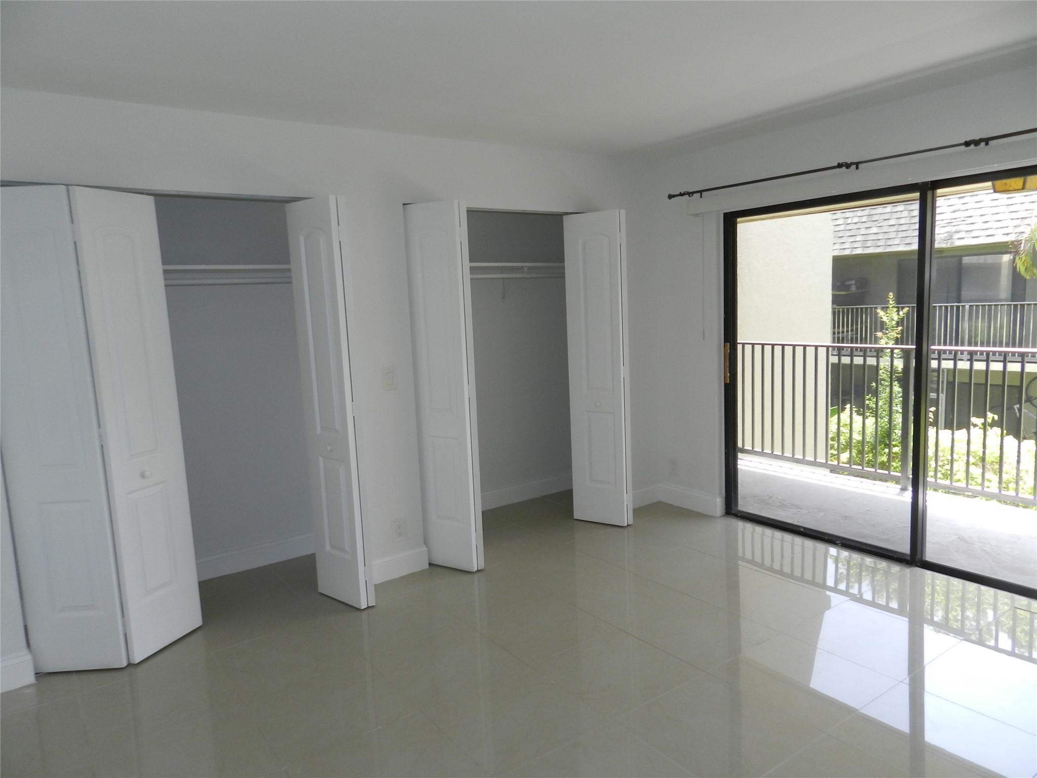 73 Deer Creek Road, Unit 103 Deerfield Beach, FL 33442 - Photo 10 of 28 Primary Bedroom Big Closet