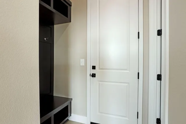 a empty closet with white paint