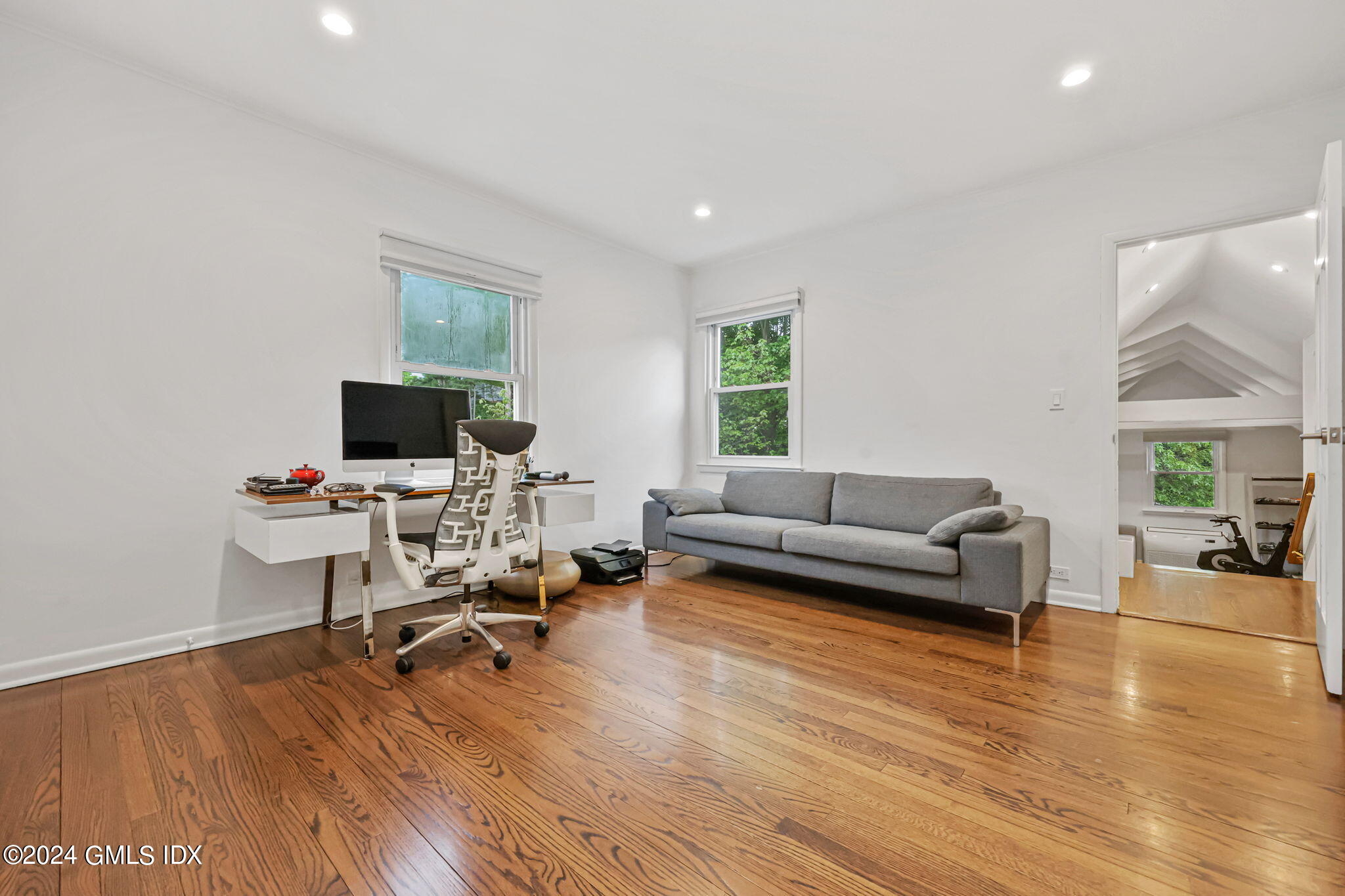 68 Willowmere Circle Riverside, CT 06878 - Photo 15 of 29 a living room with furniture and a flat screen tv