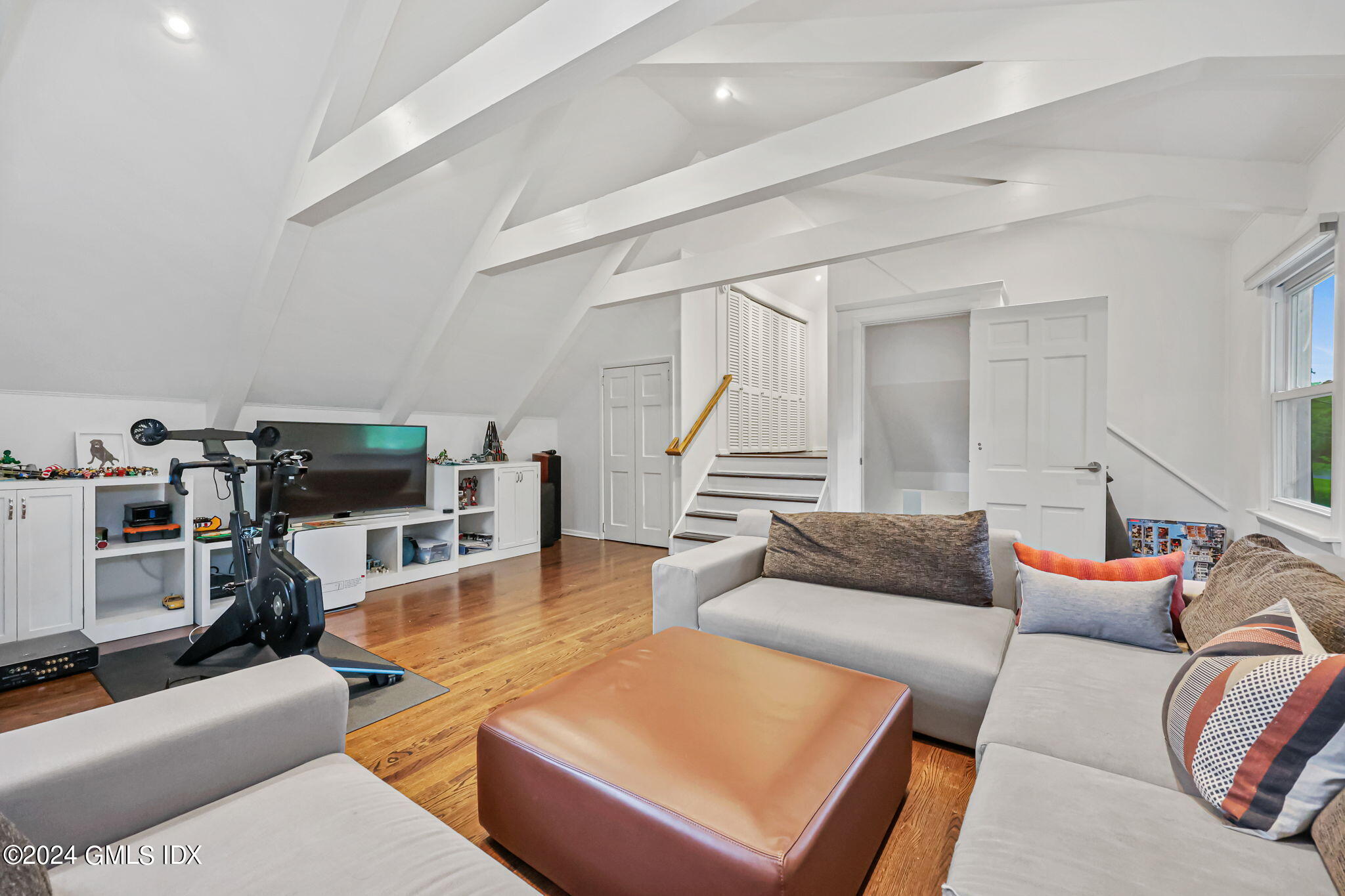 68 Willowmere Circle Riverside, CT 06878 - Photo 16 of 29 a living room with furniture and a flat screen tv