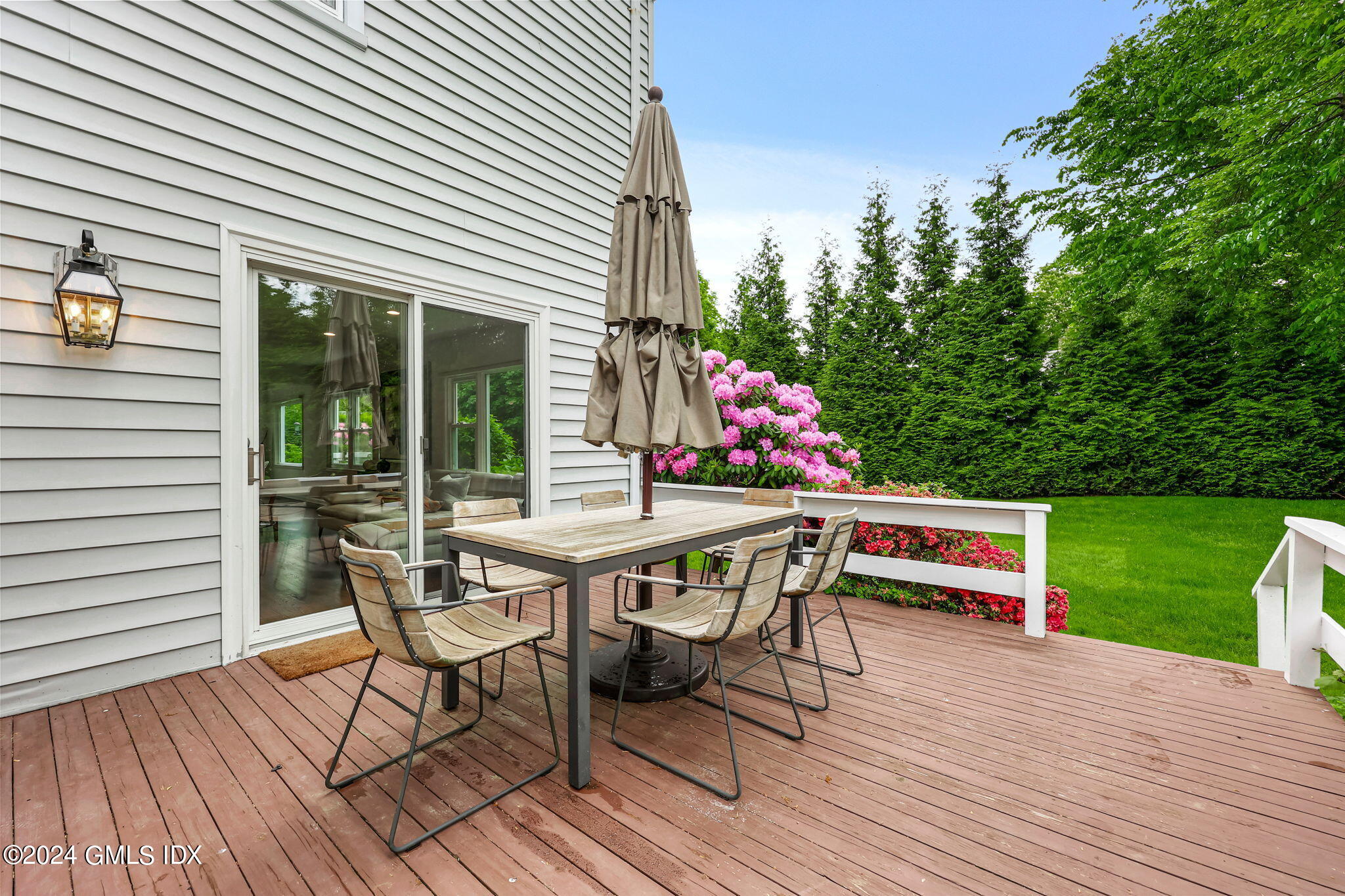 68 Willowmere Circle Riverside, CT 06878 - Photo 18 of 29 a table and chairs with the wooden floor