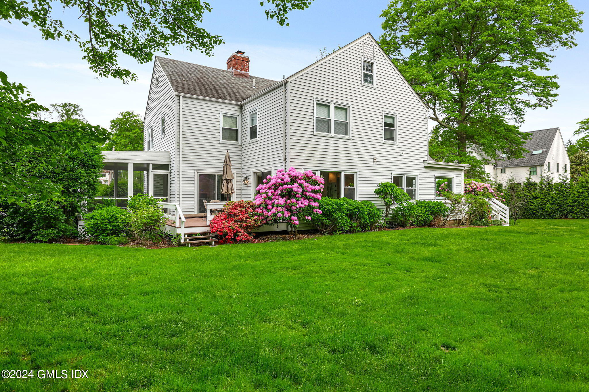 68 Willowmere Circle Riverside, CT 06878 - Photo 20 of 29 a view of a house with a yard