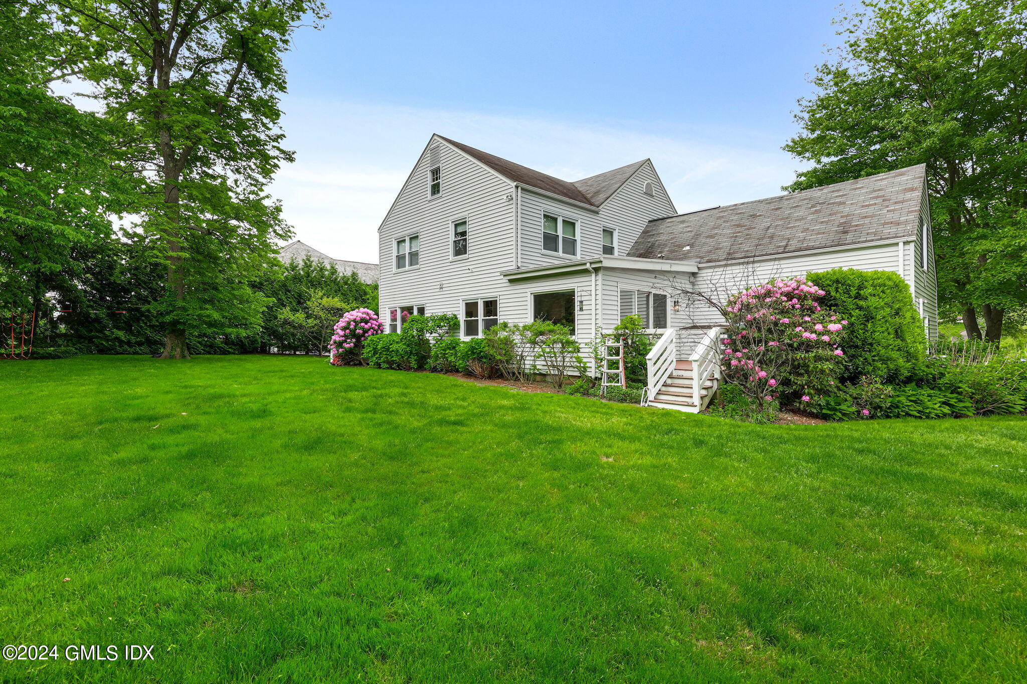 68 Willowmere Circle Riverside, CT 06878 - Photo 21 of 29 a view of outdoor space yard and front view of a house