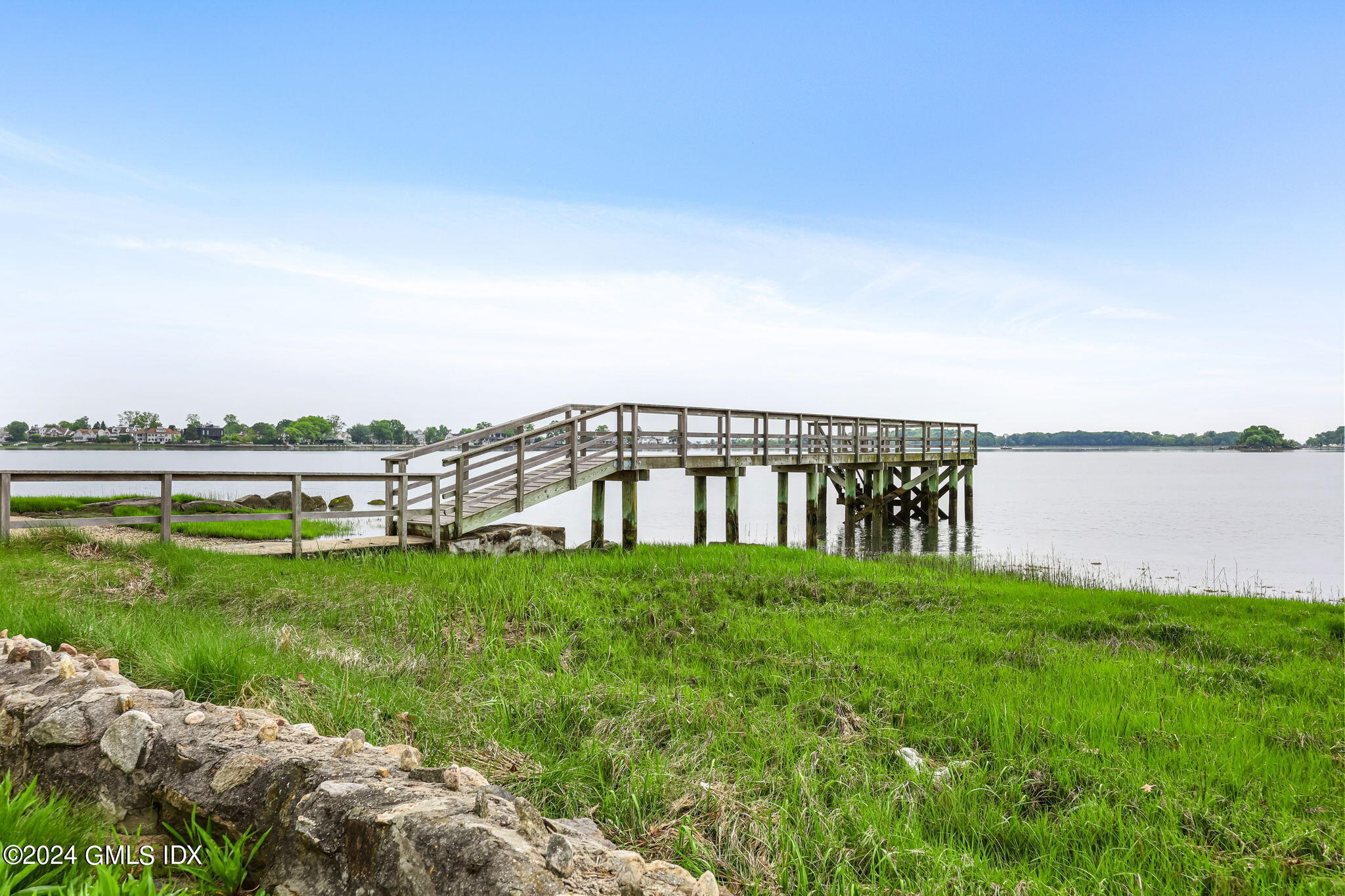 68 Willowmere Circle Riverside, CT 06878 - Photo 26 of 29 a view of a garden with lake and houses in the back