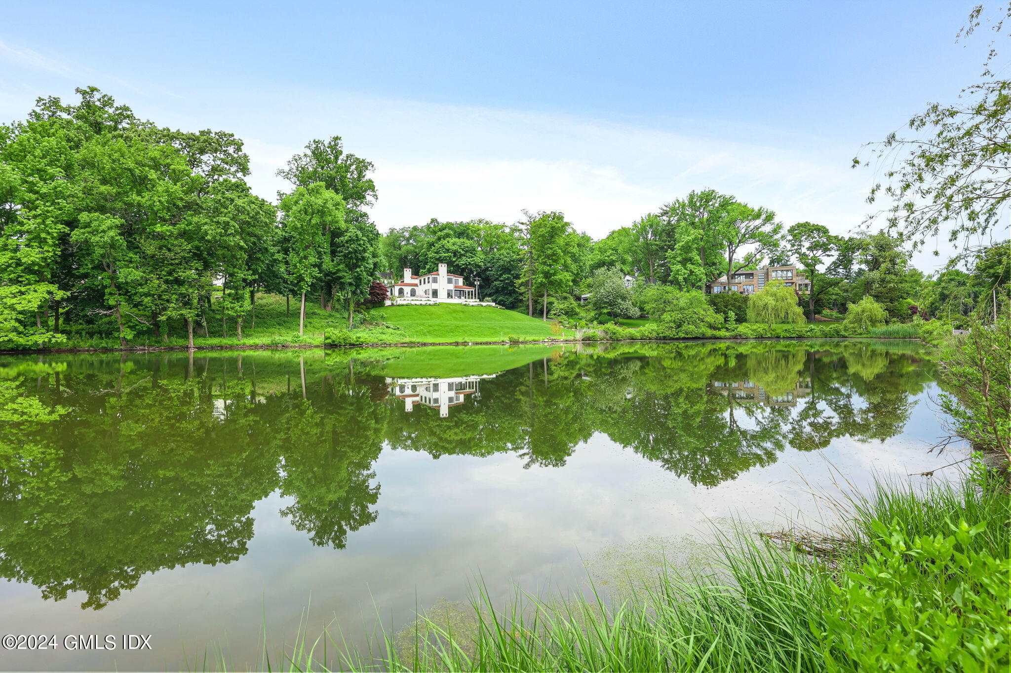 68 Willowmere Circle Riverside, CT 06878 - Photo 27 of 29 a view of a lake with a big yard