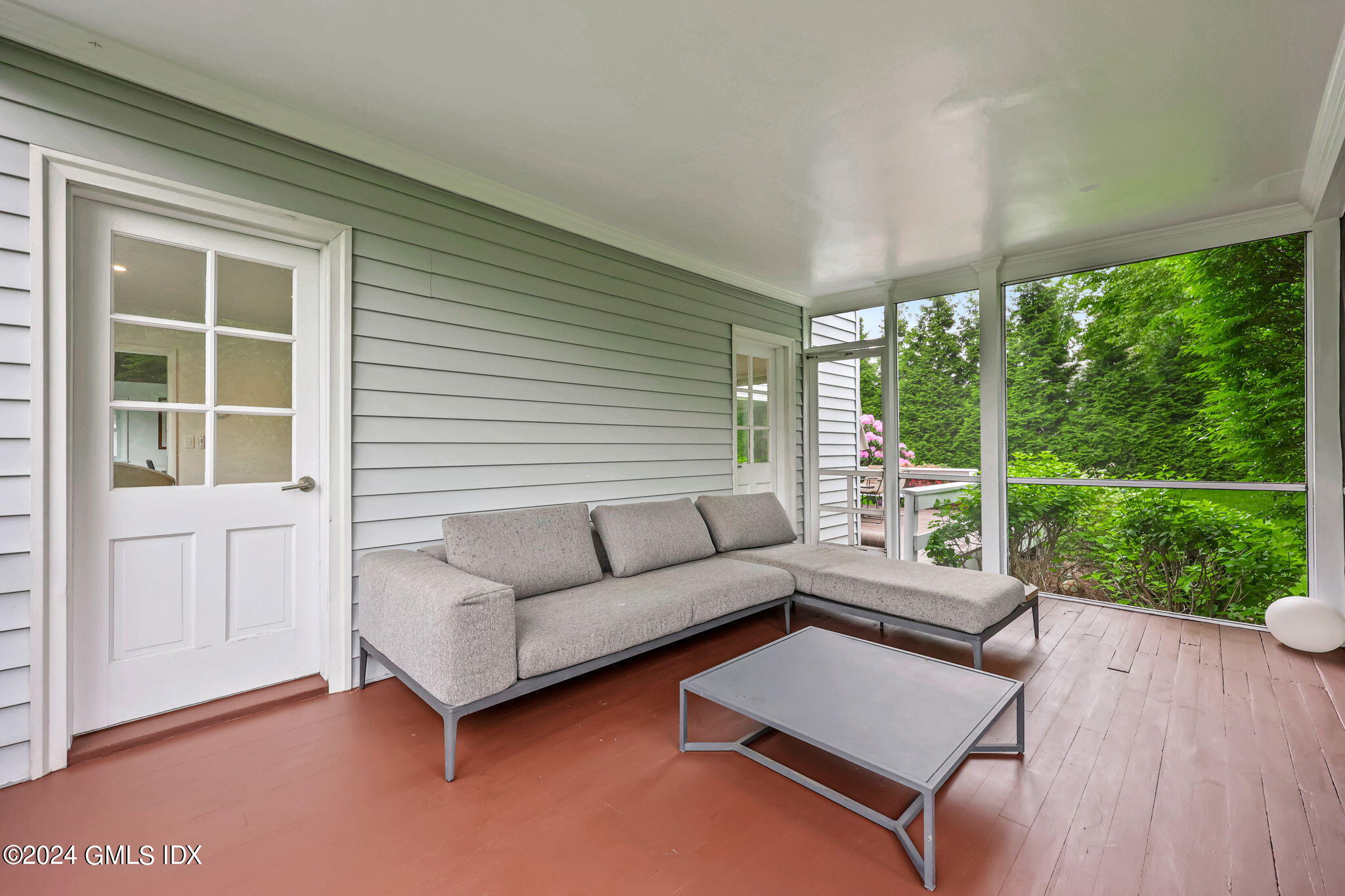 68 Willowmere Circle Riverside, CT 06878 - Photo 5 of 29 a living room with furniture and a large window