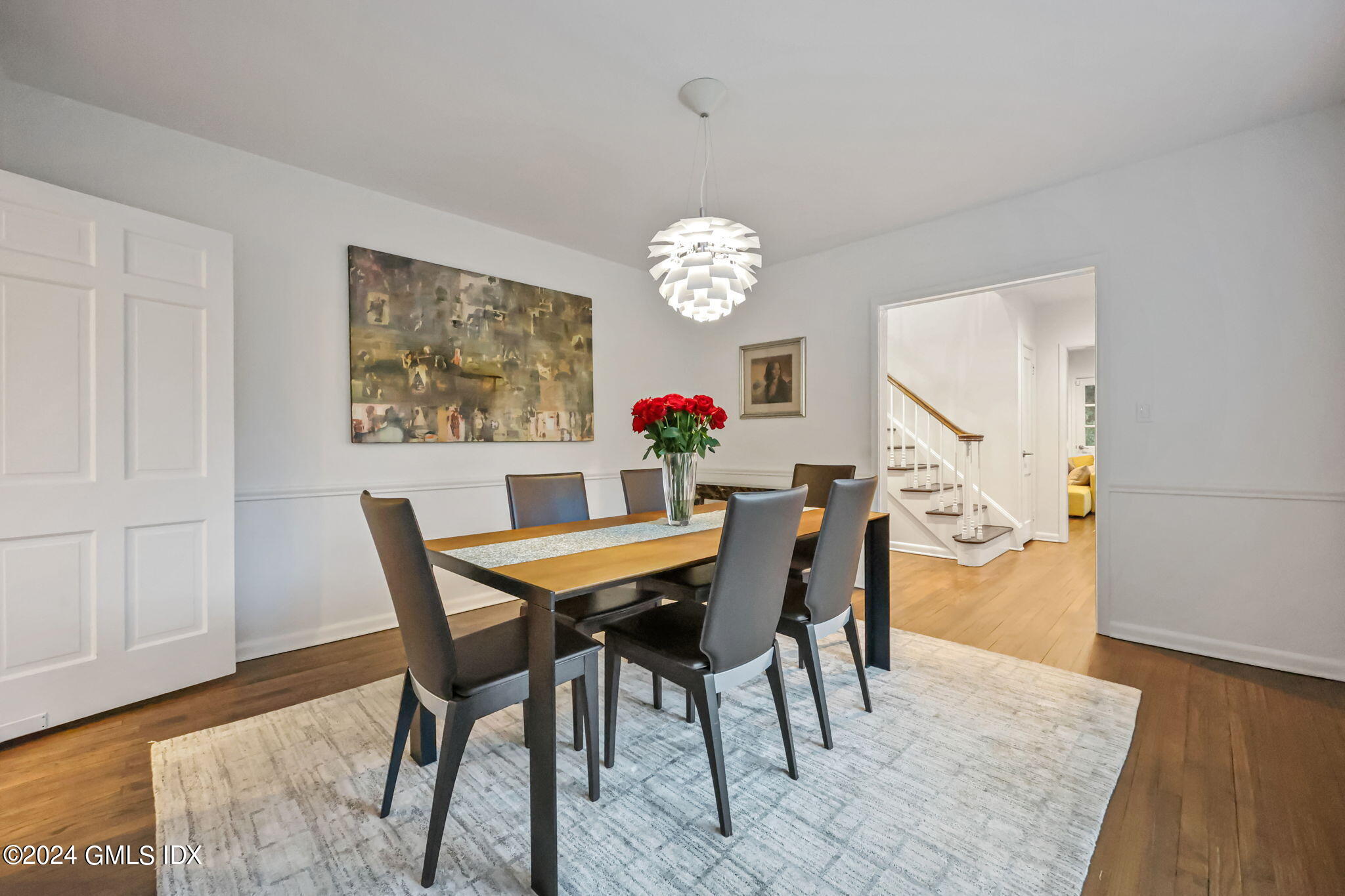 68 Willowmere Circle Riverside, CT 06878 - Photo 6 of 29 a view of a dining room with furniture and wooden floor
