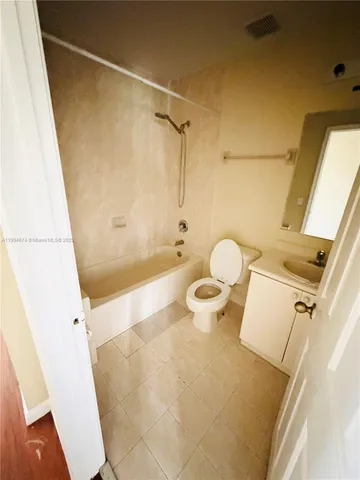 a bathroom with a sink and a shower
