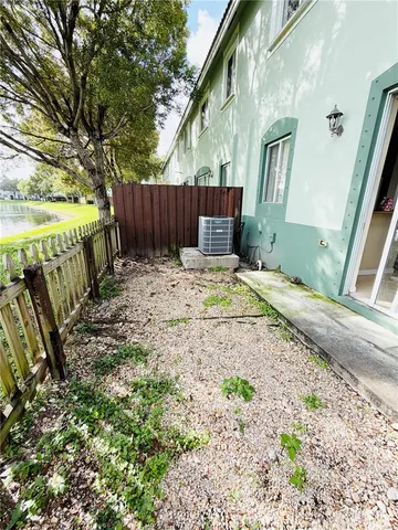 a view of a garden and lake