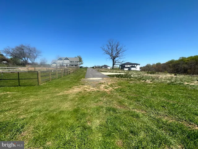 a view of a lake with a big yard
