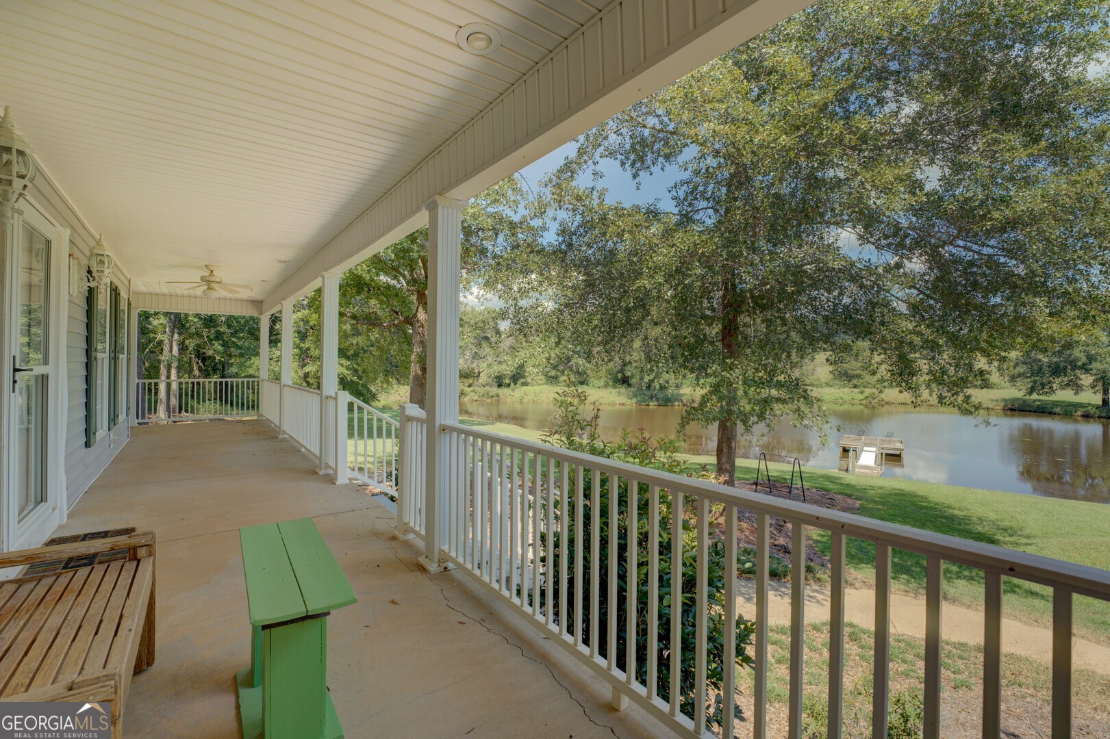 925 Highway 36 East Jackson, GA 30233 - Photo 11 of 90 a balcony with green trees in front of it