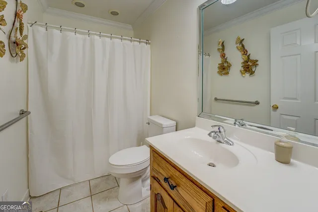 a bathroom with a sink a mirror and a shower