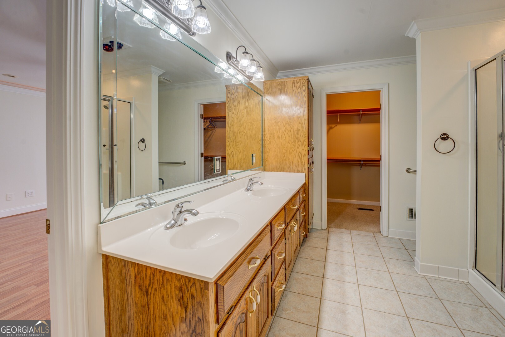 925 Highway 36 East Jackson, GA 30233 - Photo 38 of 90 a bathroom with a sink a mirror and a shower