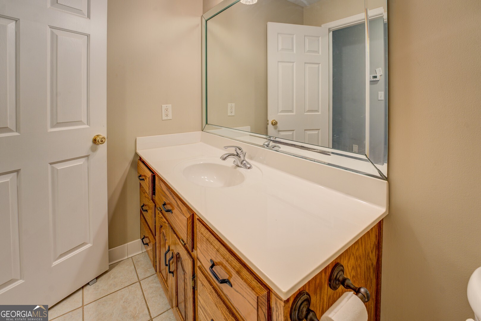 925 Highway 36 East Jackson, GA 30233 - Photo 46 of 90 a bathroom with a sink and a mirror