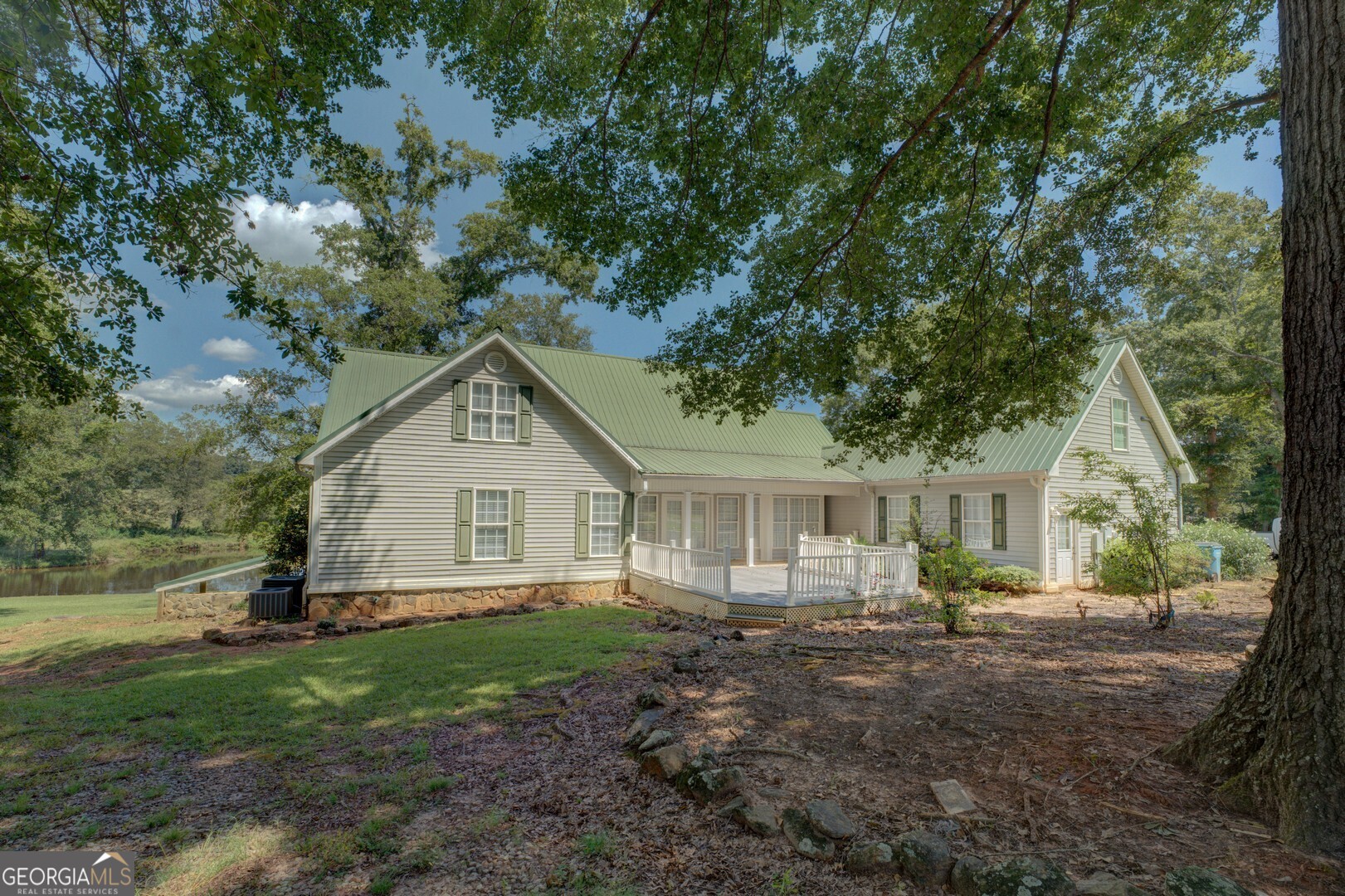 925 Highway 36 East Jackson, GA 30233 - Photo 76 of 90 a view of outdoor space yard and front view of a house