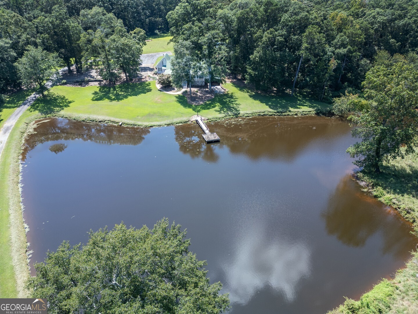 925 Highway 36 East Jackson, GA 30233 - Photo 83 of 90 an aerial view of a house with yard swimming pool and outdoor seating