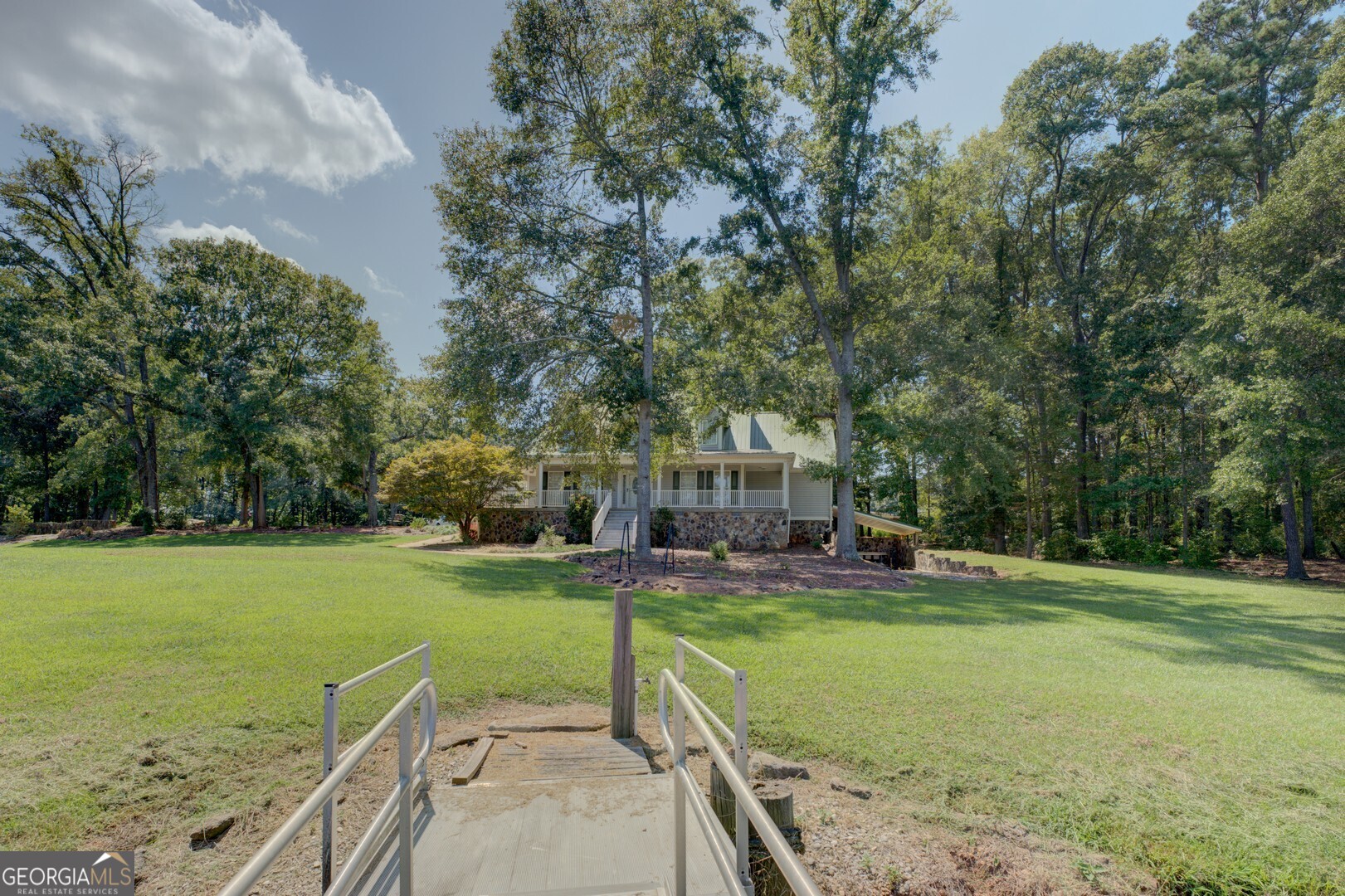 925 Highway 36 East Jackson, GA 30233 - Photo 87 of 90 a view of a house with swimming pool and a yard