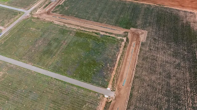 a view of a pool from a balcony