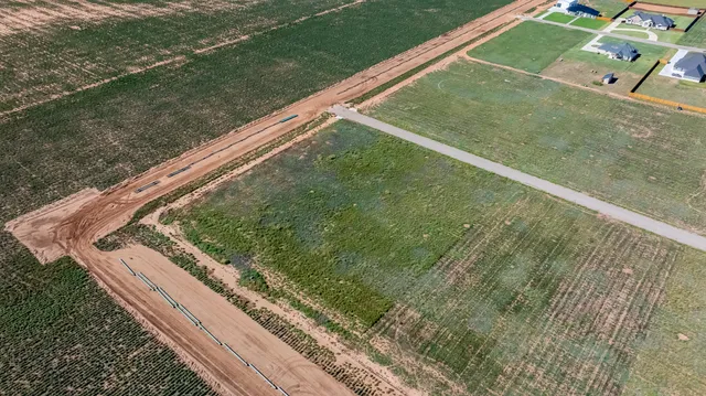 a view of a back yard of the green space