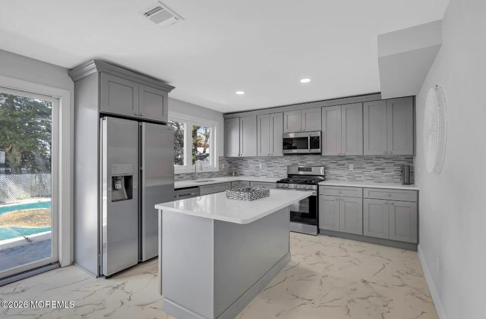 1143-1145 Roe Avenue Point Pleasant, NJ 08742 - Photo 2 of 32 02_LivingRoom