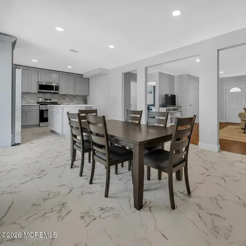 a view of a dining room with furniture