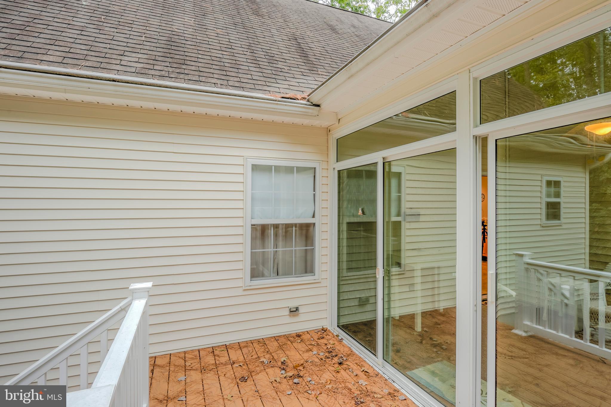 57 Sandyhook Road Ocean Pines, MD 21811 - Photo 15 of 52 View from deck to slider to 3 season glass room