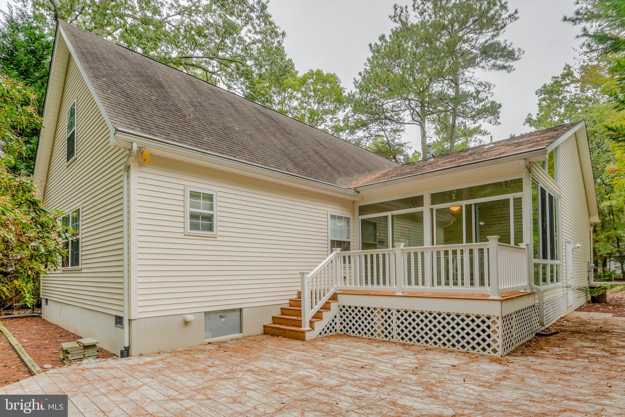 57 Sandyhook Road Ocean Pines, MD 21811 - Photo 18 of 52 Rear view to deck and glass enclosed porch