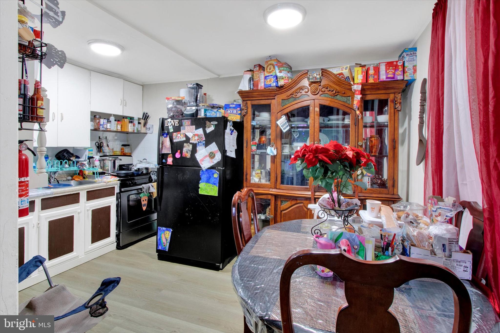 238 South 5th Street Reading, PA 19602 - Photo 12 of 28 a dining room filled with furniture and toys