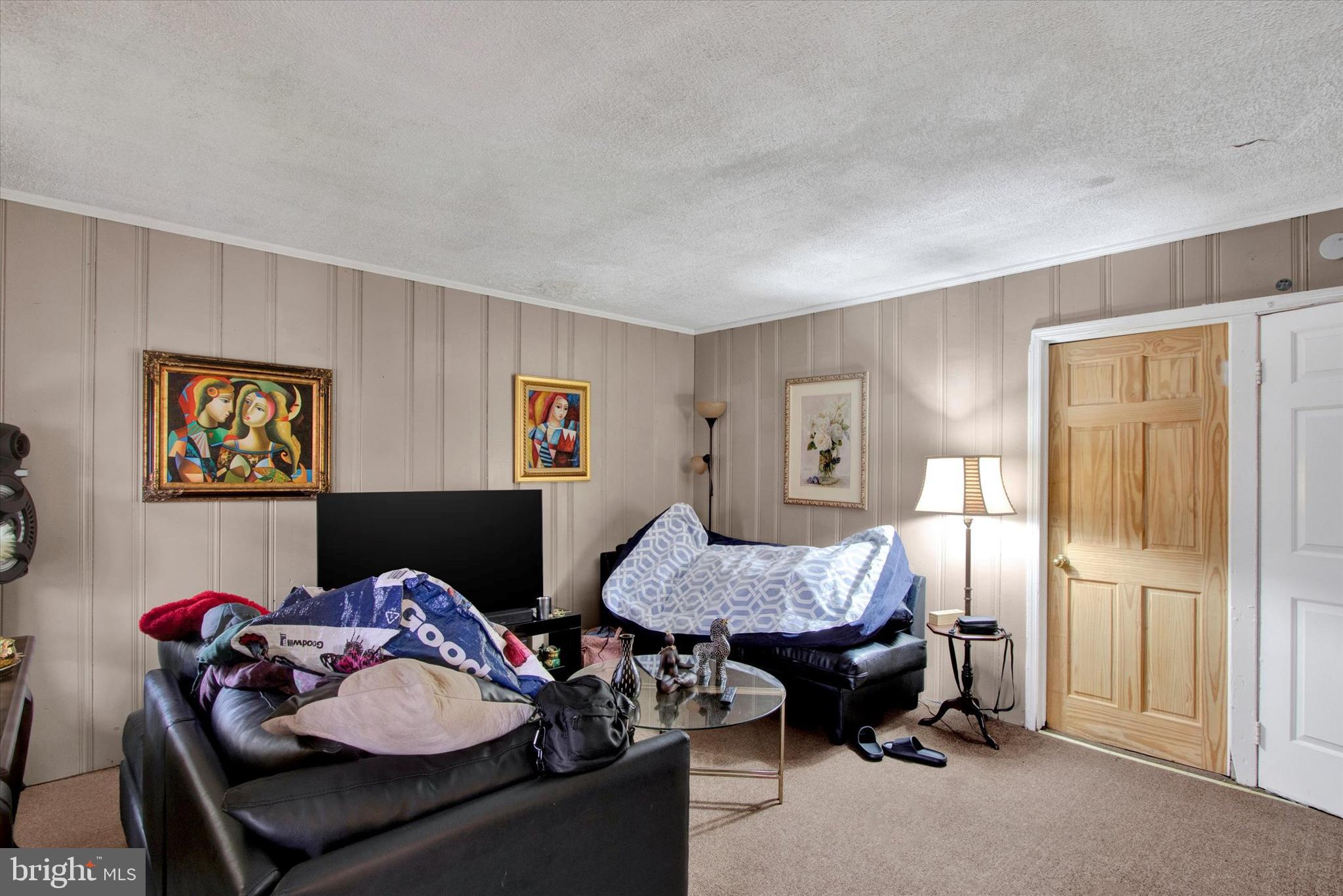 238 South 5th Street Reading, PA 19602 - Photo 13 of 28 a living room with furniture and a window