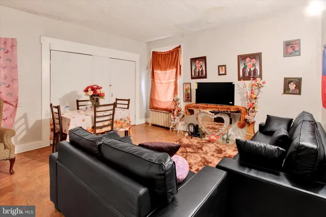 a kitchen with stainless steel appliances a stove a sink and a refrigerator