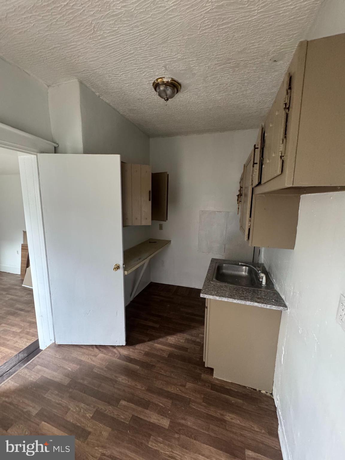 238 South 5th Street Reading, PA 19602 - Photo 20 of 28 a room with storage and utility