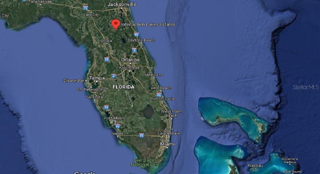 604 Kitty Interlachen, FL 32148 - Photo 10 of 13 an aerial view of a house having yard