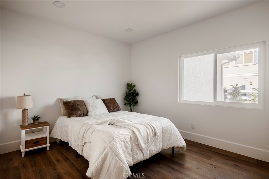 26868 Canyon End Road Canyon Country, CA 91387 - Photo 18 of 41 a bedroom with a bed and a window