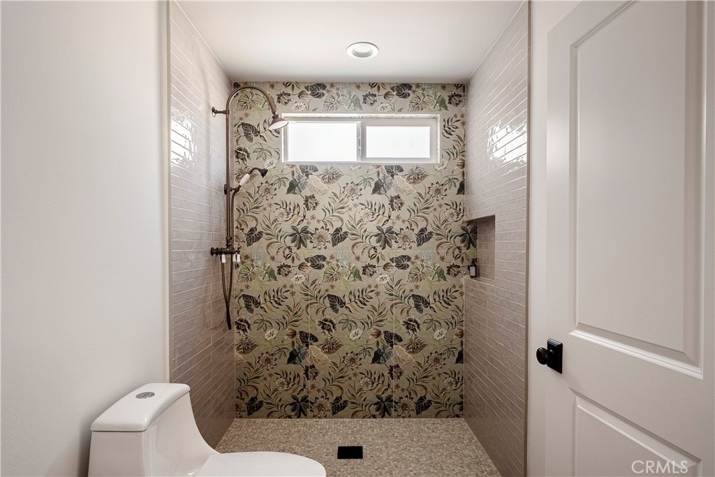 26868 Canyon End Road Canyon Country, CA 91387 - Photo 31 of 41 a bathroom with a toilet and a shower