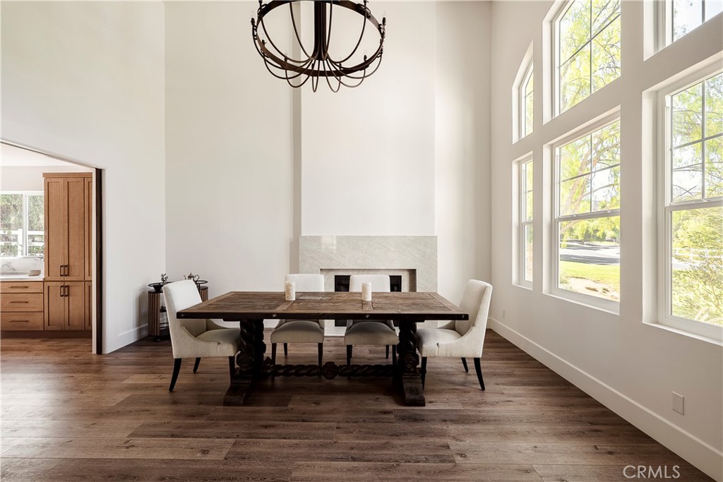 26868 Canyon End Road Canyon Country, CA 91387 - Photo 4 of 41 a view of a dining room with furniture window and wooden floor