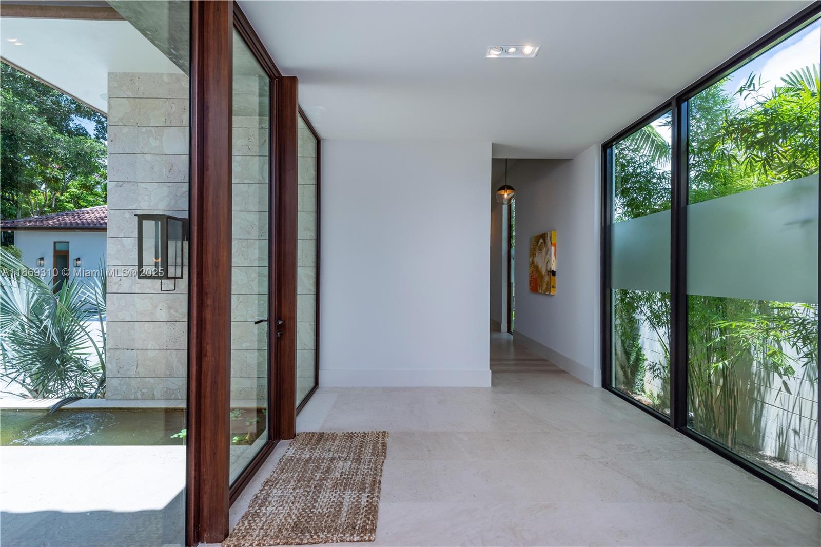 864 Northeast 84th Street Miami, FL 33138 - Photo 11 of 53 an entrance view with a garden view