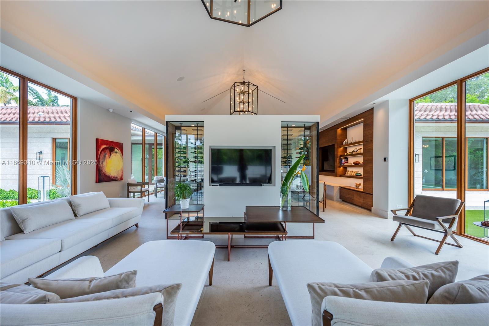 864 Northeast 84th Street Miami, FL 33138 - Photo 12 of 53 a living room with furniture and a fireplace