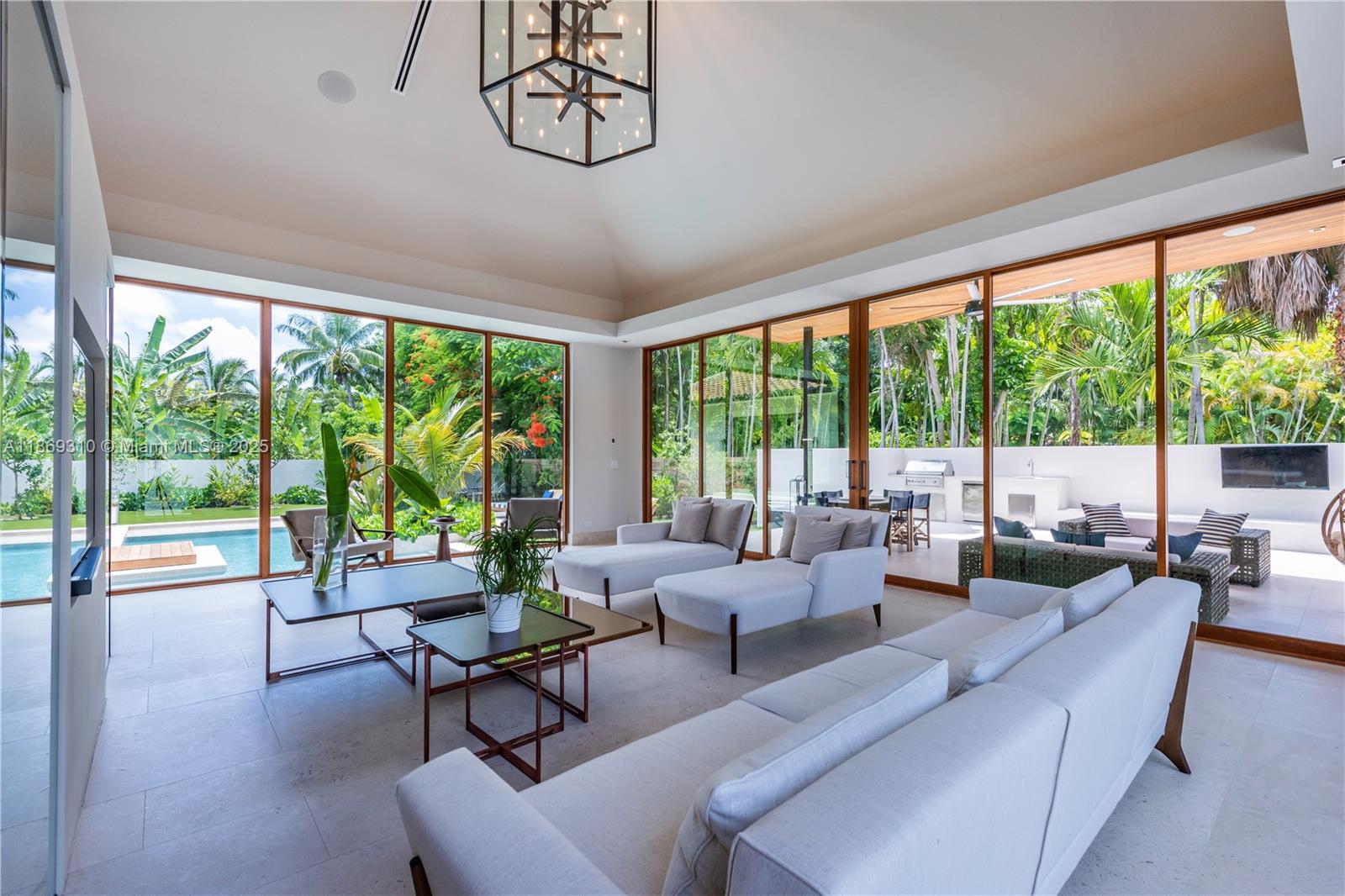 864 Northeast 84th Street Miami, FL 33138 - Photo 15 of 53 a living room with furniture and a large window