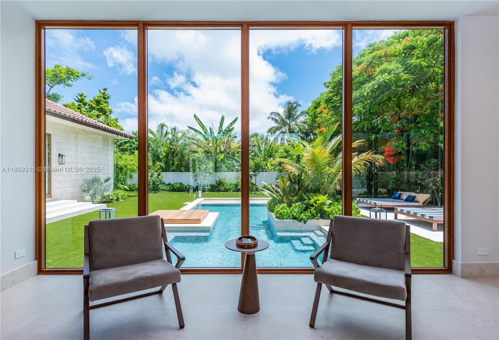 864 Northeast 84th Street Miami, FL 33138 - Photo 20 of 53 a sitting area with furniture and garden view