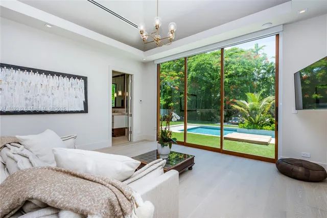 a bathroom with a double vanity sink and a large mirror