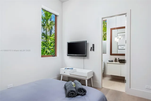 a view of balcony with a potted plant