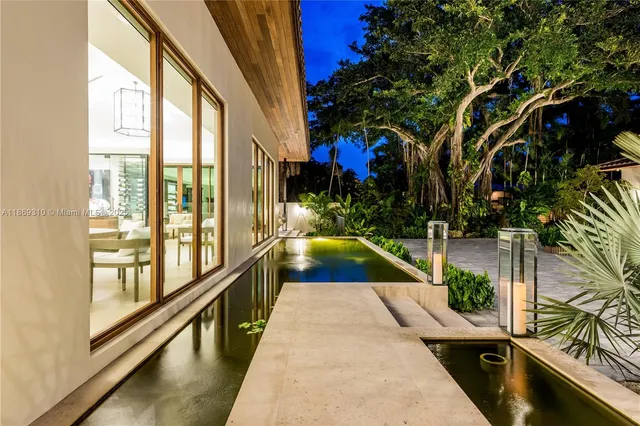 a view of a house with a swimming pool