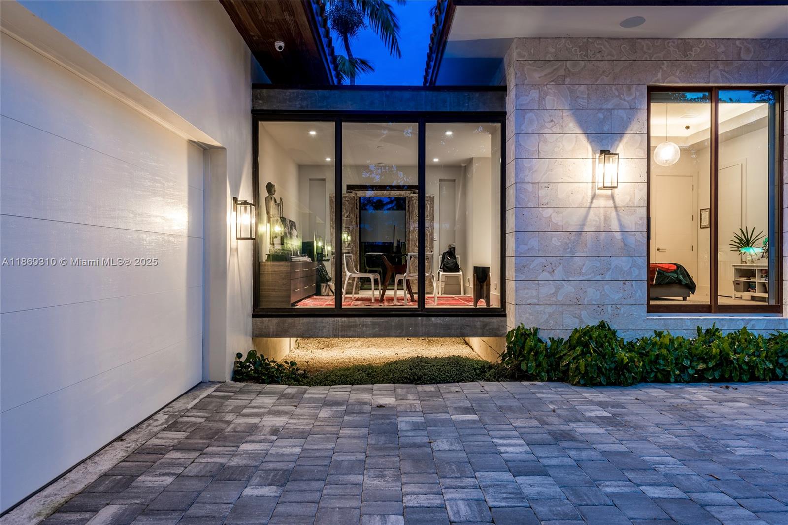 864 Northeast 84th Street Miami, FL 33138 - Photo 50 of 53 a view of a brick house with a outdoor space