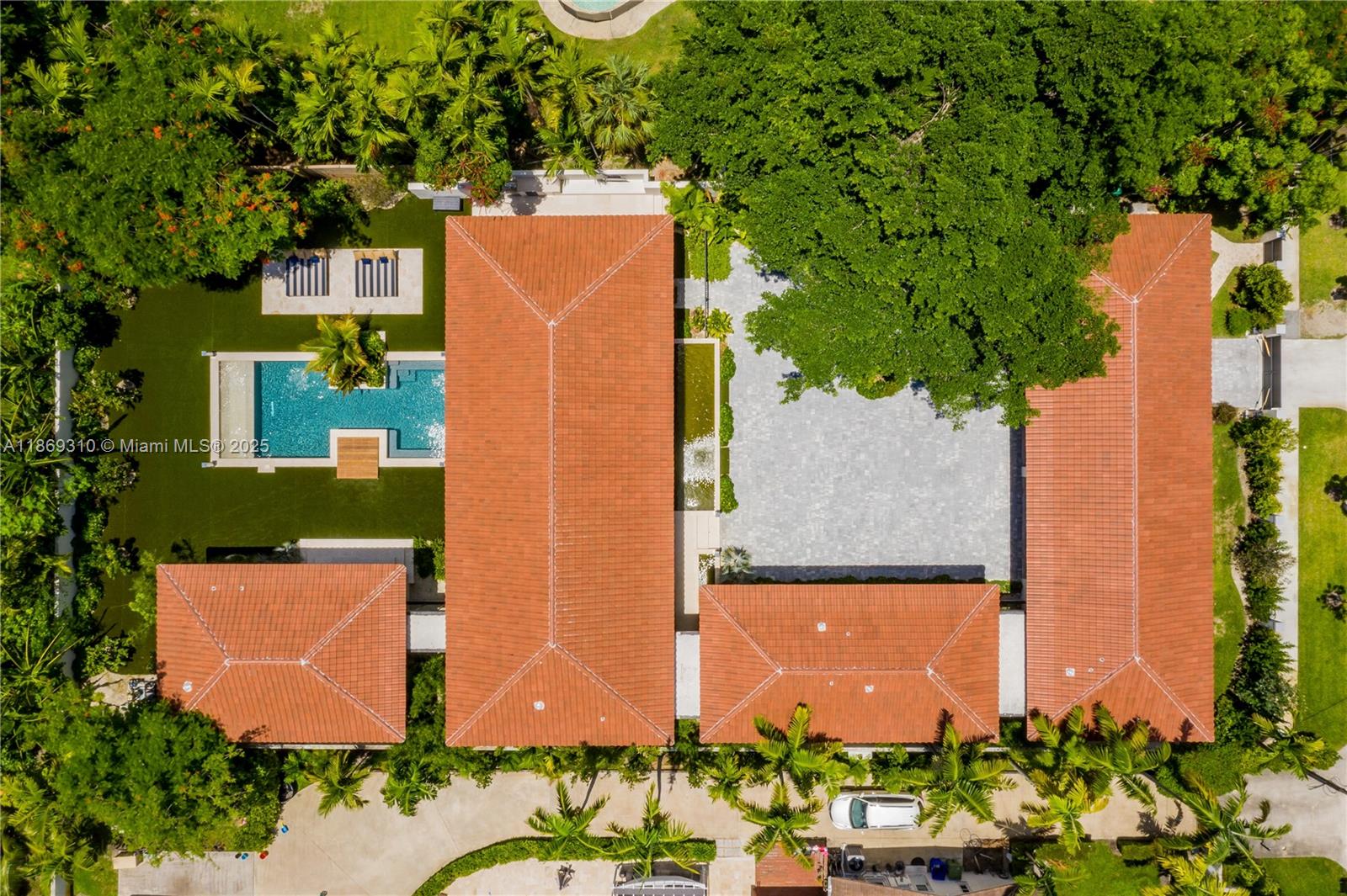 864 Northeast 84th Street Miami, FL 33138 - Photo 5 of 53 an aerial view of a house with a yard and lake view